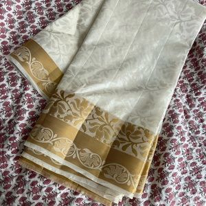 Gold and cream saree